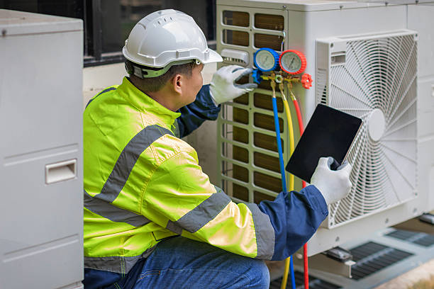 Professional Hvac technician working in Norfolk, MA